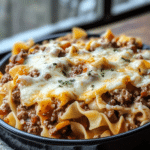A serving of Sour Cream Beef Noodle Casserole on a plate.