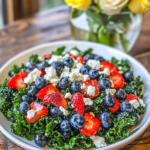 Individual servings of Summer Kale Salad on plates.