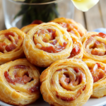 Puff Pastry Pinwheels arranged on a party tray, ready to be served.