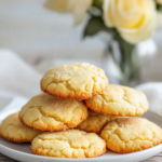 Keto Cream Cheese Cookies stacked or served with a cup of coffee.