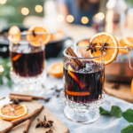 Simmering red wine with oranges and spices in a saucepan for Mulled Wine.