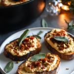 Spreading the creamy pumpkin ricotta mixture onto grilled slices of bread for Pumpkin Ricotta Toasts.