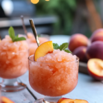 Scraping the frozen peach and rosé mixture with a fork to create the granita texture.