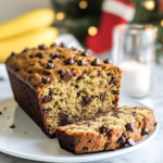 Folding chocolate chips into the batter for Quinoa Flour Banana Bread.