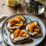 Ingredients for Burrata Toast with Caramelized Peaches, including crusty bread, burrata cheese, fresh peaches, balsamic glaze, and herbs.