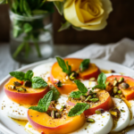 A close-up of the Peach Caprese salad, highlighting the fresh ingredients and colorful presentation.