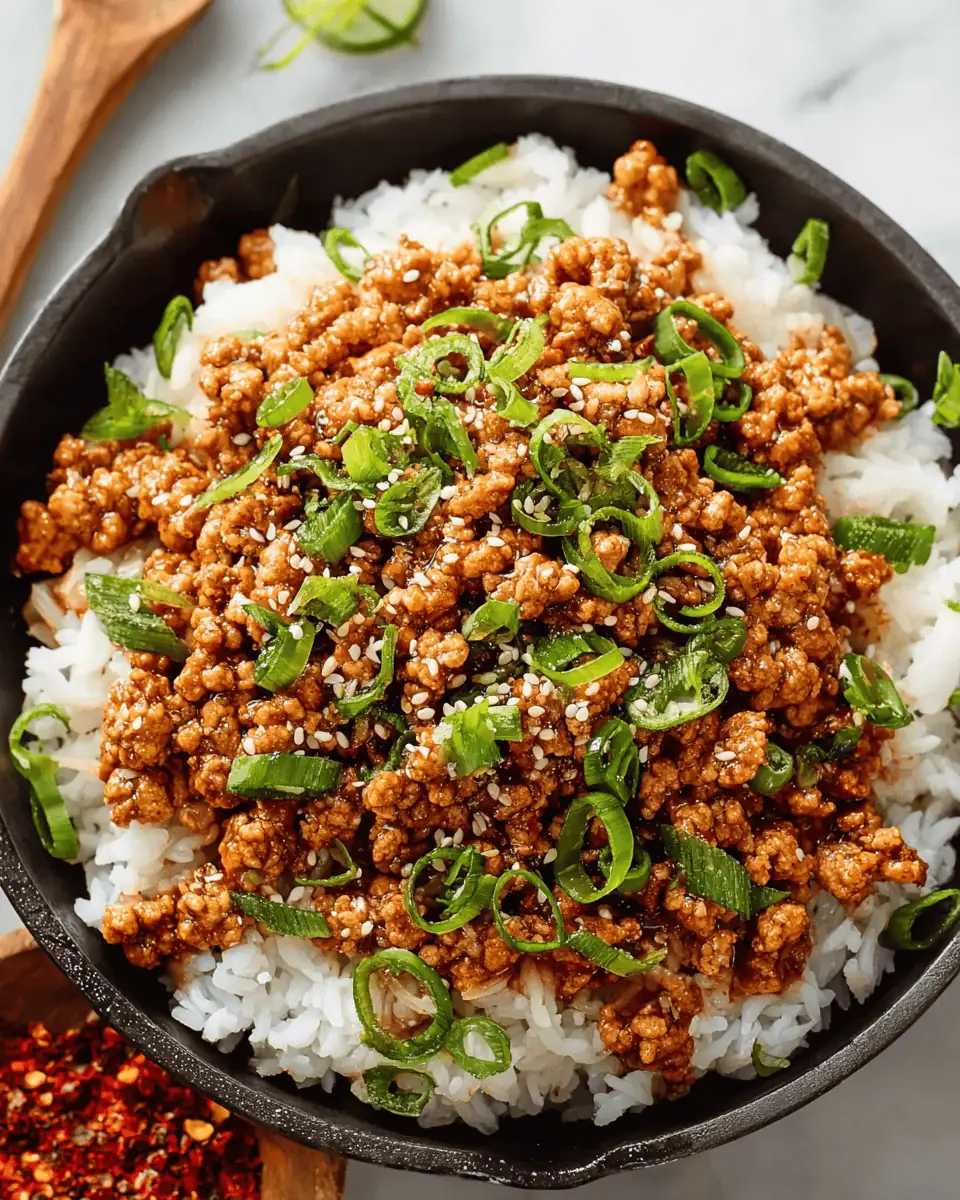 A close-up shot of the savory and sweet honey garlic ground turkey, showing the thick glaze.