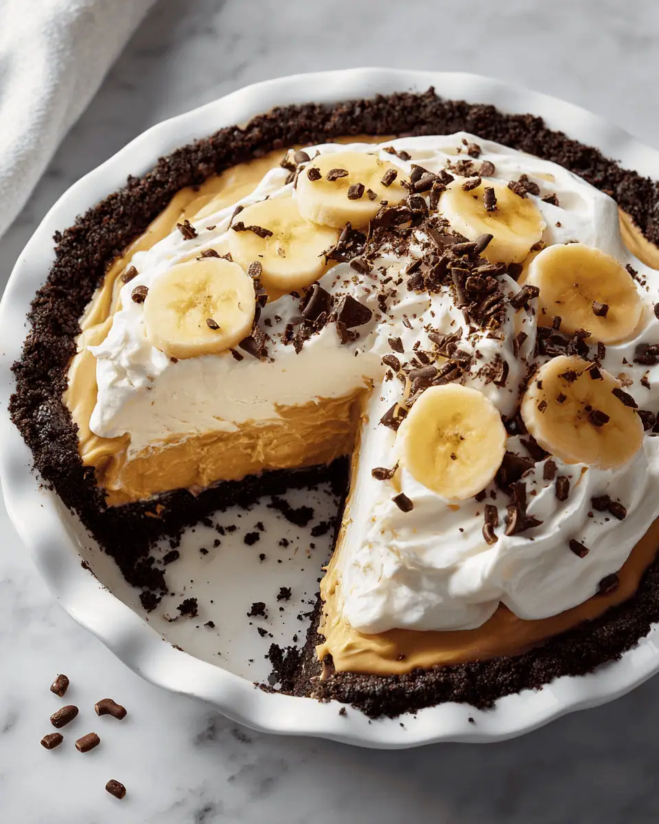 Peanut Butter Banana Pie - No-Bake Creamy Delight 2 An overhead shot of the peanut butter banana pie, highlighting the pattern of sliced bananas under the filling.